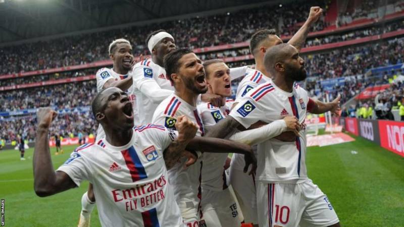 Alexandre Lacazette scored four goals, including a 100th-minute penalty, to help his Lyon side beat 