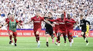 Alderweireld seals Antwerp’s Belgian league title with last-minute goal.